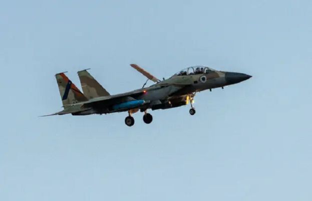 Iran downs warplane, launches missile strikes on Israel