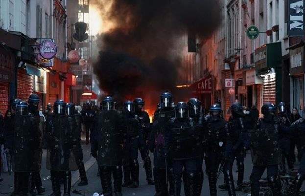 Tensions flare again in Paris as France counts cost of worst unrest in years